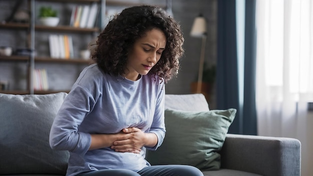 Young woman with aching belly