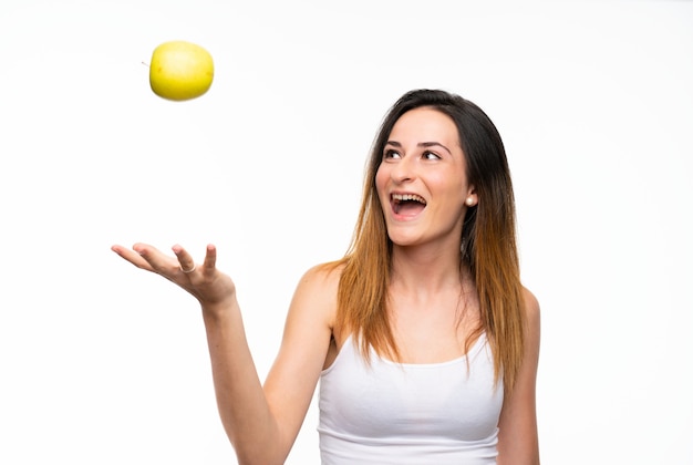 Young woman with an apple white 