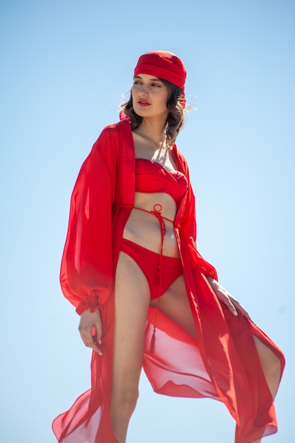 Young woman with beach pareo during tropical vacation Beautiful girl enjoy her summer holidays