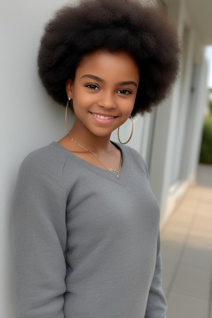 A young woman with a big afro on her face