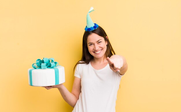 Young woman with a birthday cake