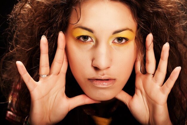 Young woman with bright makeup