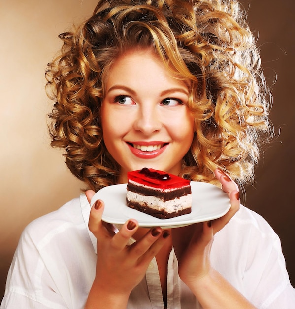 Young woman with a cake