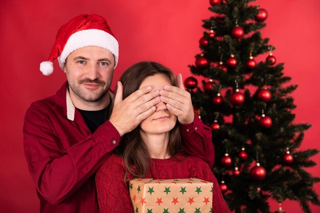 Young woman with christmas tree