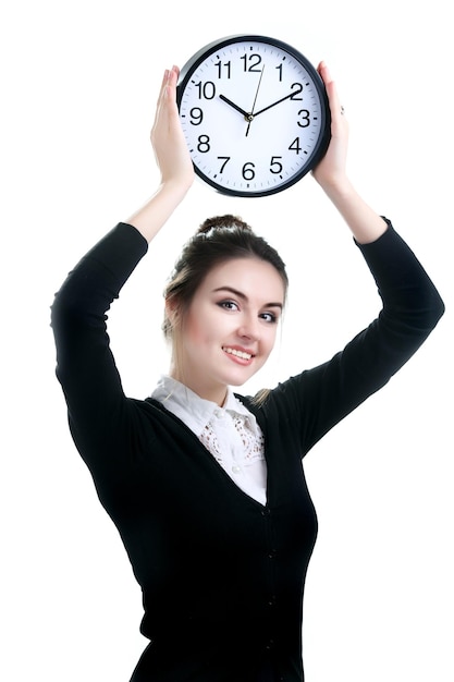 Young woman with clock isolated on white