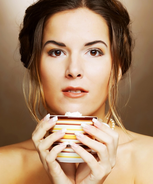 Young woman with a cup of coffee