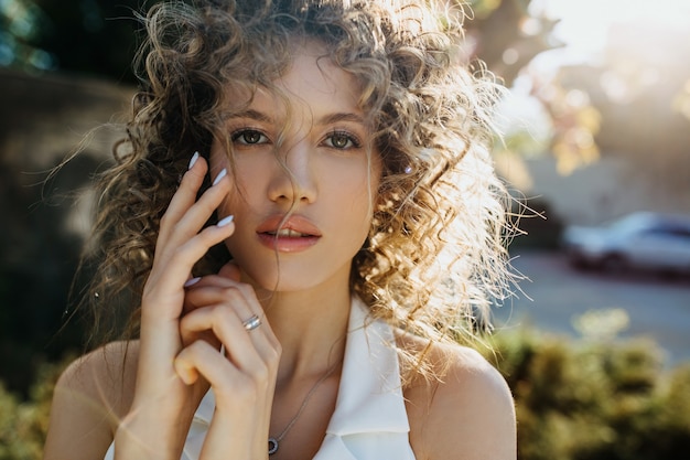 Young woman with curly hair