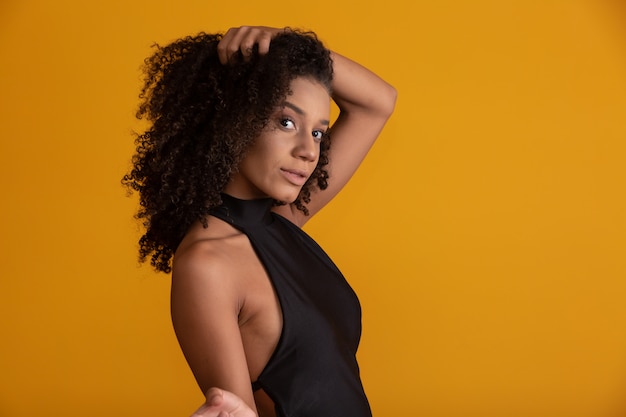 Young woman with curly hair.