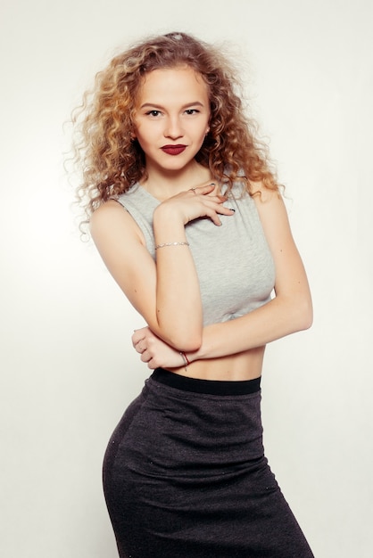 Young woman with curly long hair