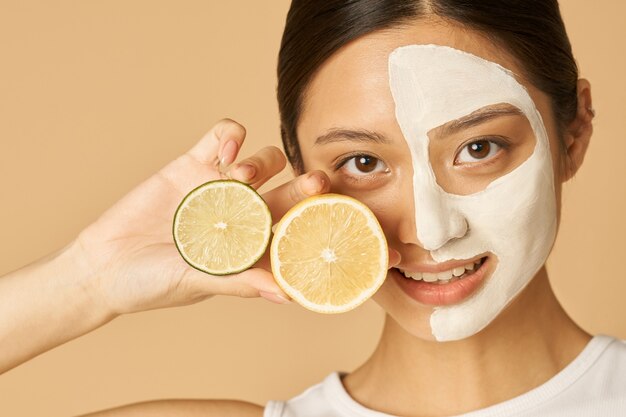 young woman with facial mask . 