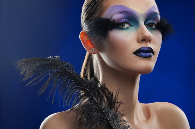 Young woman with fantasy makeup