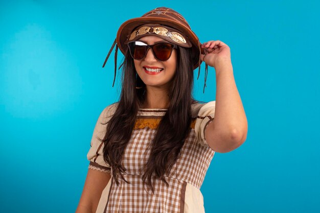 Young woman with festa junina outfit in studio