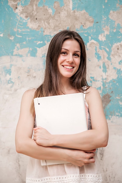 Young woman with file