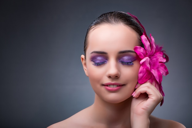 Young woman with flower decoration