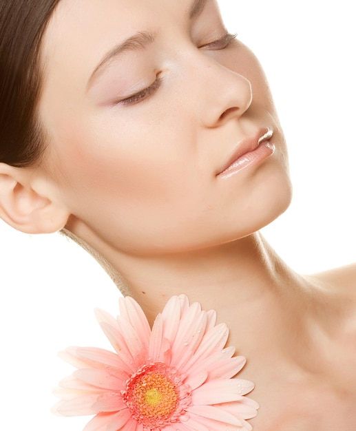 Young woman with gerber flower