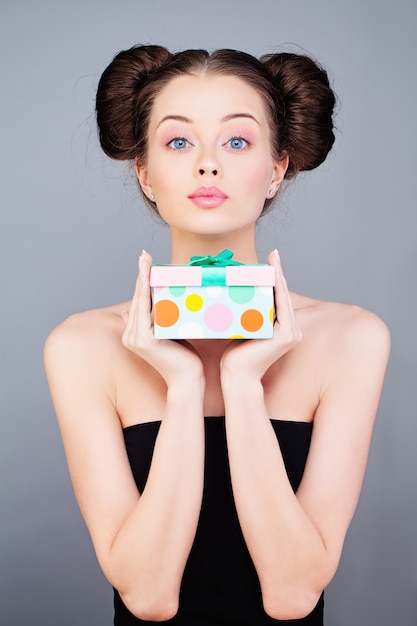 Young Woman with Gift Box