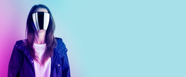 Young woman with glasses and BP in a blue jacket added gradient on a light background Banner