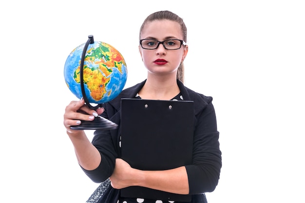 Young woman with globe isolated on white wall