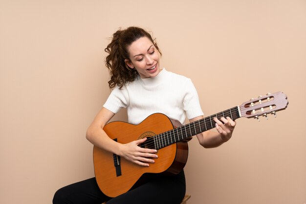 Young woman with guitar