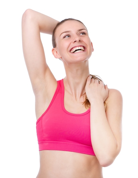 Young woman with hand in hair