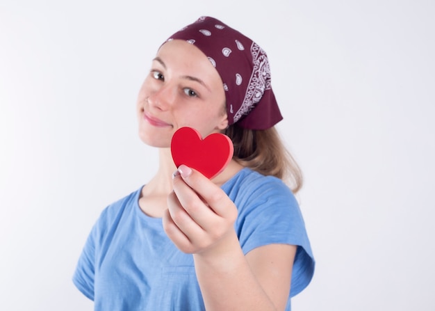 young woman with happy healthy life holding happy red heart