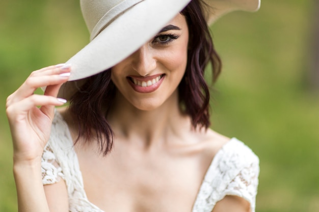 Young woman with a hat