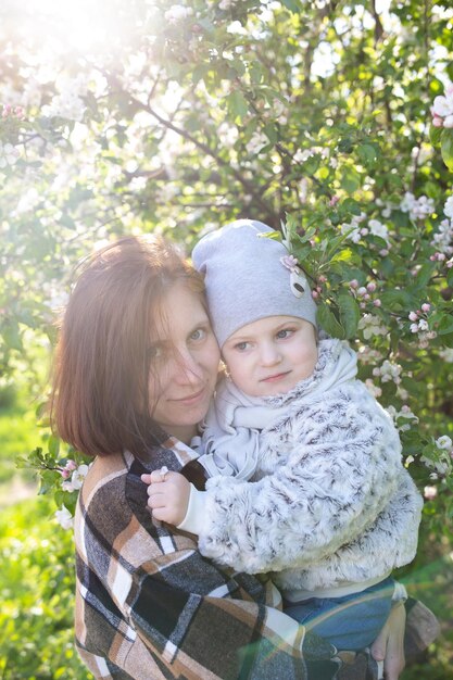 Premium Photo  Portrait of woman in winter clothes on the nature