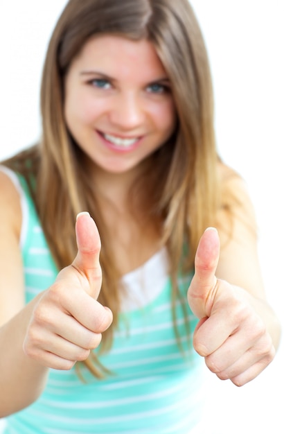 Photo young woman with her thumbs up to the camera