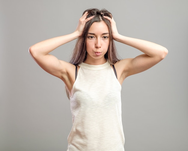 Young woman with long hair in a casual outfit