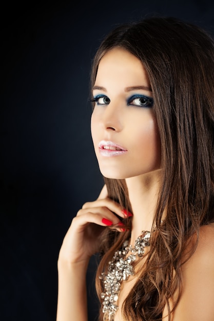 Young Woman with Makeup. Beauty Fashion Portrait