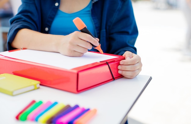 young woman with marker at university