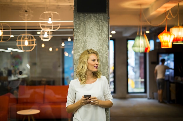 Young woman with mobile phone