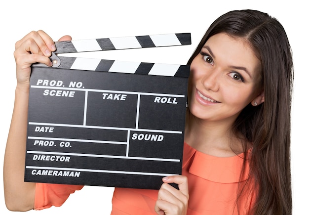young woman with movie clapper isolated on white