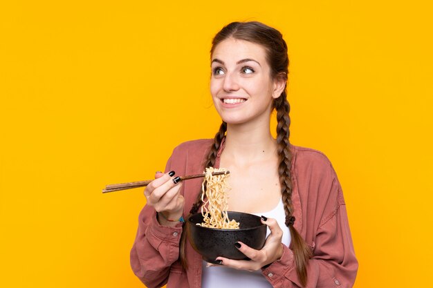 Young woman with noodles