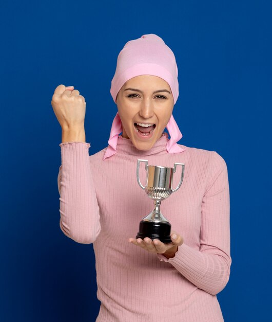 Young woman with pink scarf on the head