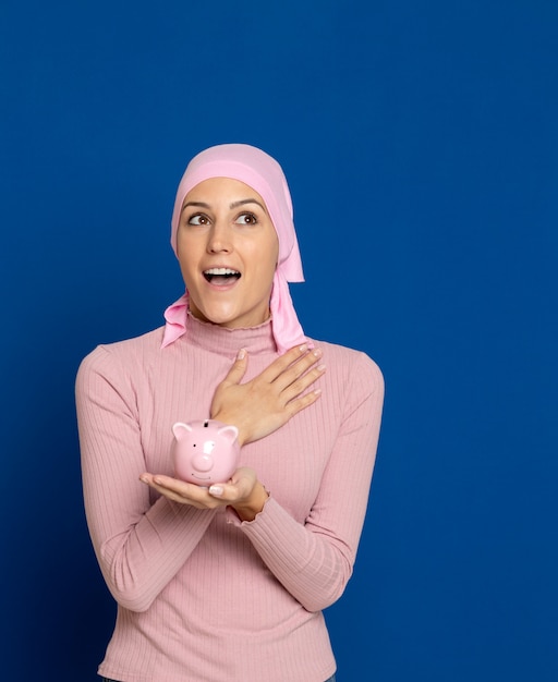 Young woman with pink scarf on the head