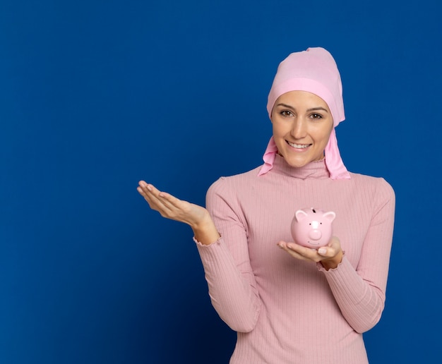 Young woman with pink scarf on the head