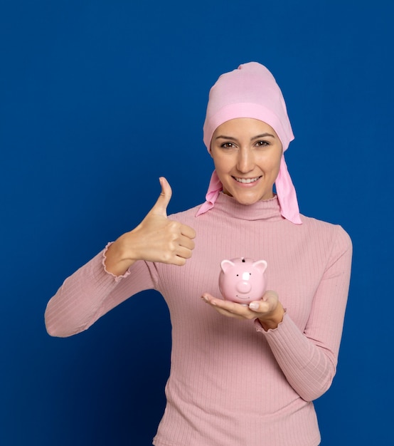 Young woman with pink scarf on the head