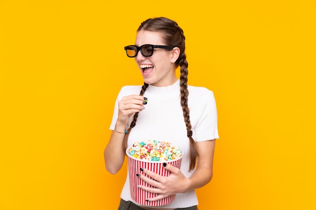 Young woman with popcorns