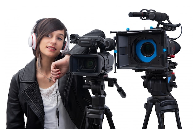 Young woman with professional video camera