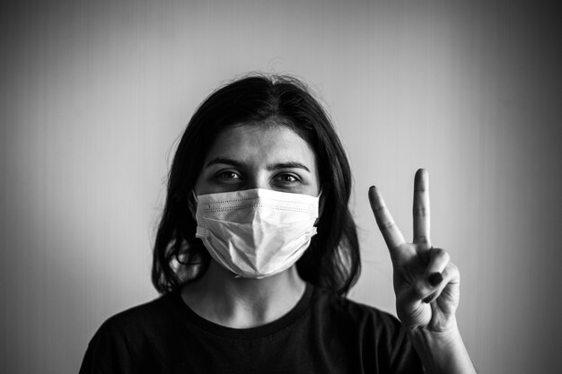 Young woman with a protective mask