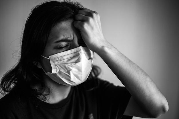 Young woman with a protective mask