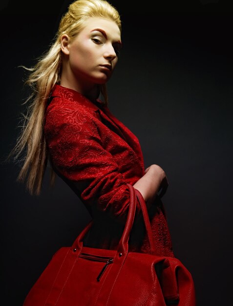 Young woman with red bag