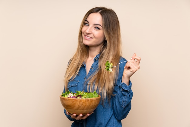 Young woman with salad 