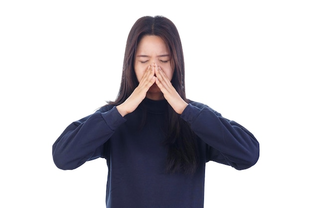 Young woman with sinus pressure pain isolated on white background