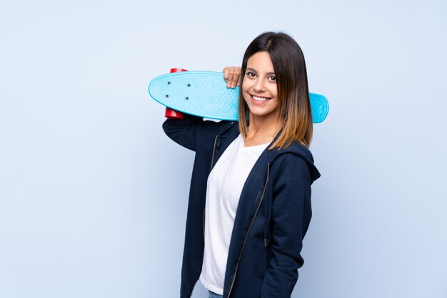 Young woman with skate