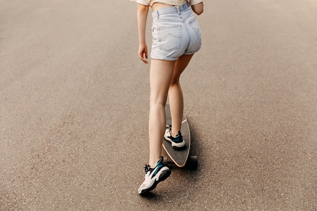 young woman with skateboard