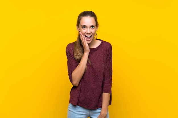 Young woman with surprise and shocked facial expression