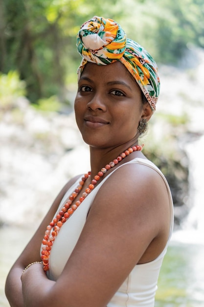 Young Woman with turban in the middle of the river