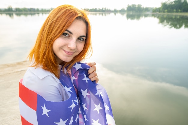 Young woman with USA national flag